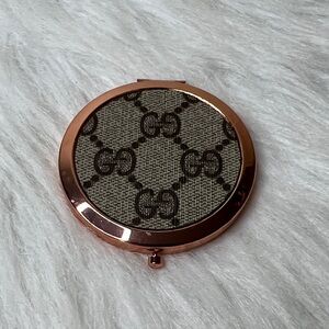 Gucci Rose Gold Compact Mirror with Signature Pattern